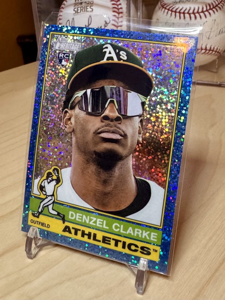 2025 Topps Heritage High Number #571 Denzel Carke Rookie Chrome Light Blue Sparkle Refractor parallel reflection